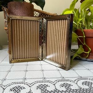 Vintage brass double picture frame- ornate etched design. Mid-century hinged